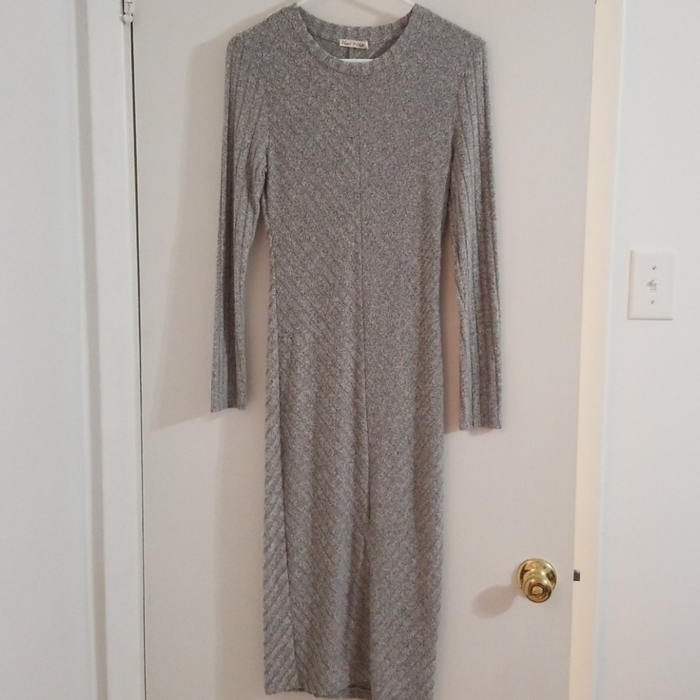 Small sweater dress with slit in front